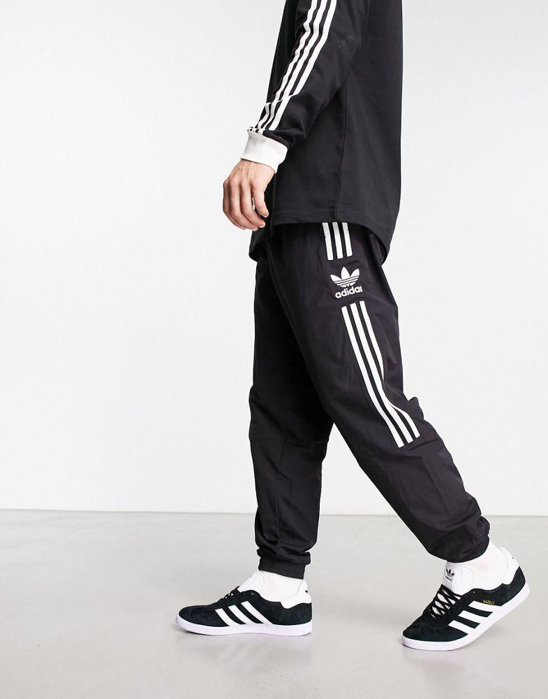 adidas Originals adicolor lock up track joggers in black商品第1张图片规格展示