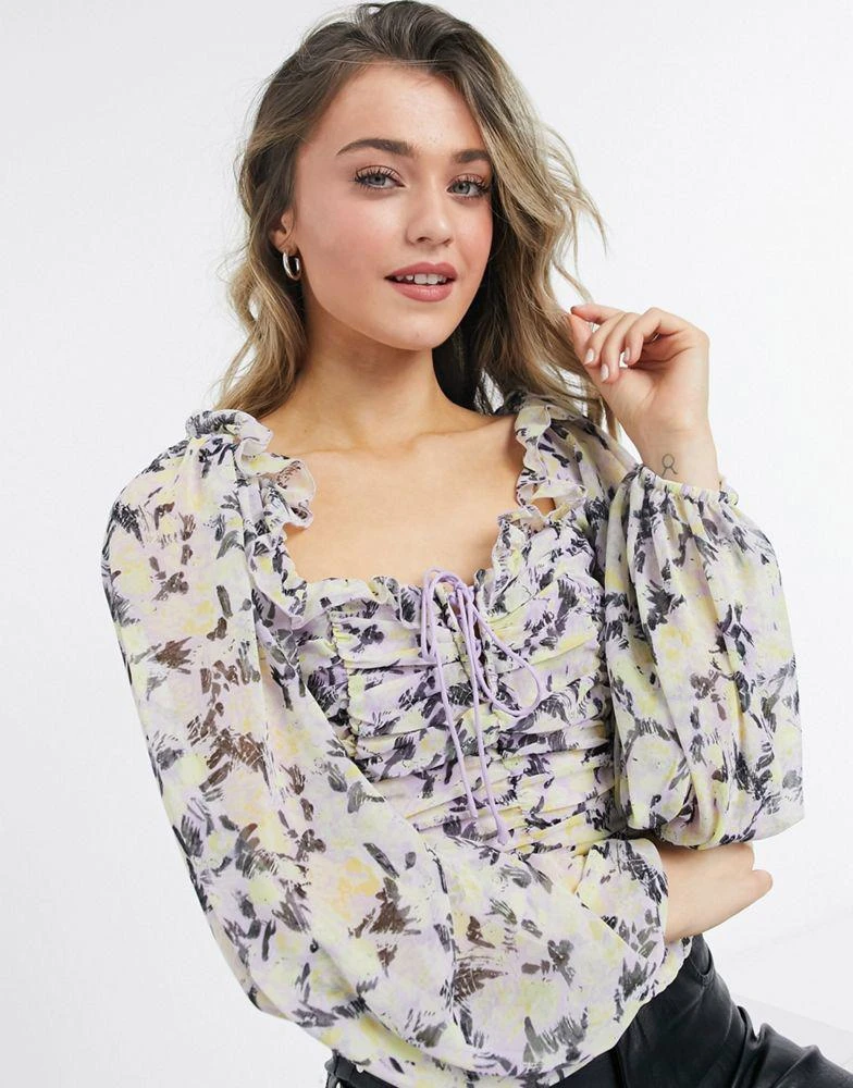 商品Free People|Free People mabel structured blouse with lace up front in floral,价格¥387,第3张图片详细描述