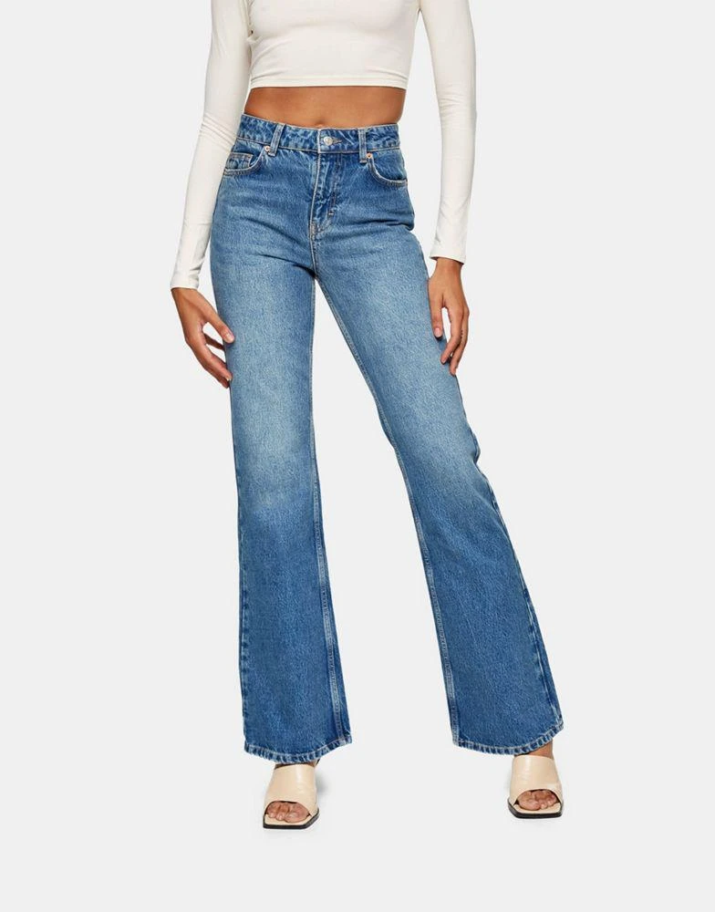 商品Topshop|Topshop 90s flare cotton blend jeans in mid blue  - MBLUE,价格¥412,第1张图片