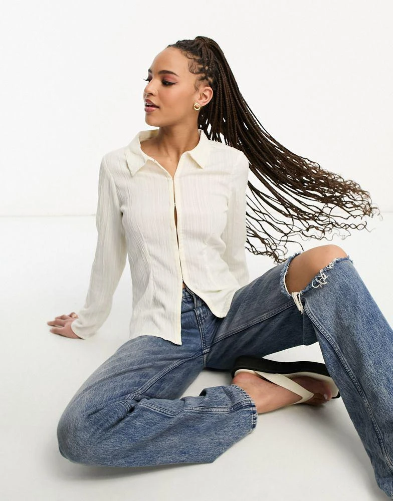 商品Monki|Monki textured hook and eye collared blouse in beige,价格¥231,第1张图片