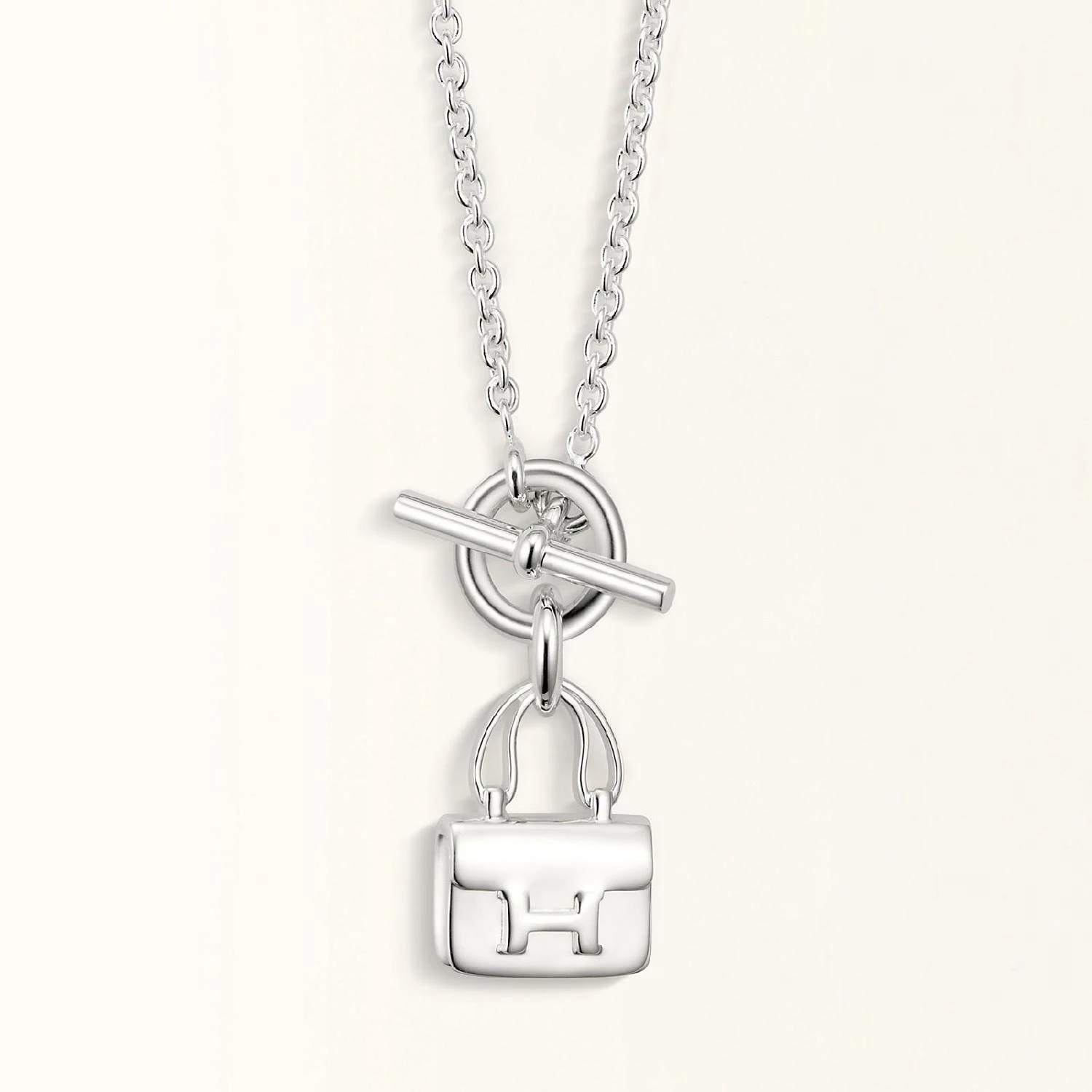 商品Hermes|【预售】 爱马仕 24秋冬 女士 吊坠 Pendentif Amulettes Constance H121324B 00,价格¥5882,第1张图片