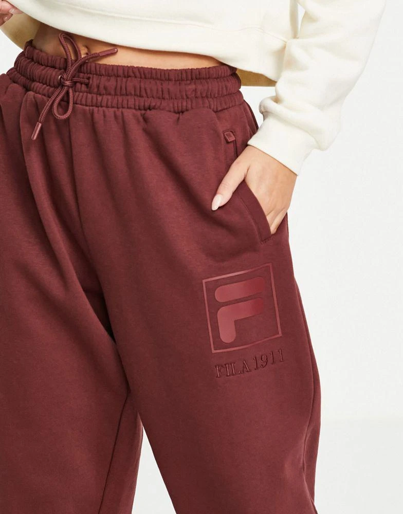 商品Fila|Fila oversized joggers with tonal branding in red,价格¥411,第3张图片详细描述