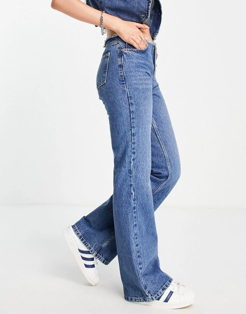 商品Topshop|Topshop raw waist band 90s flare jeans in mid blue,价格¥267,第3张图片详细描述