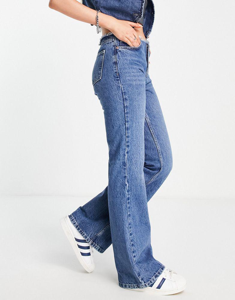 商品Topshop|Topshop raw waist band 90s flare jean in mid blue,价格¥359,第5张图片详细描述