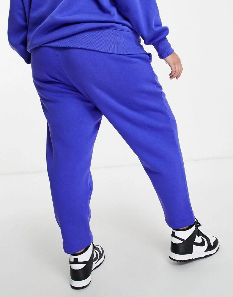 商品NIKE|Nike Plus mini swoosh curved high rise joggers in lapis blue,价格¥240,第2张图片详细描述
