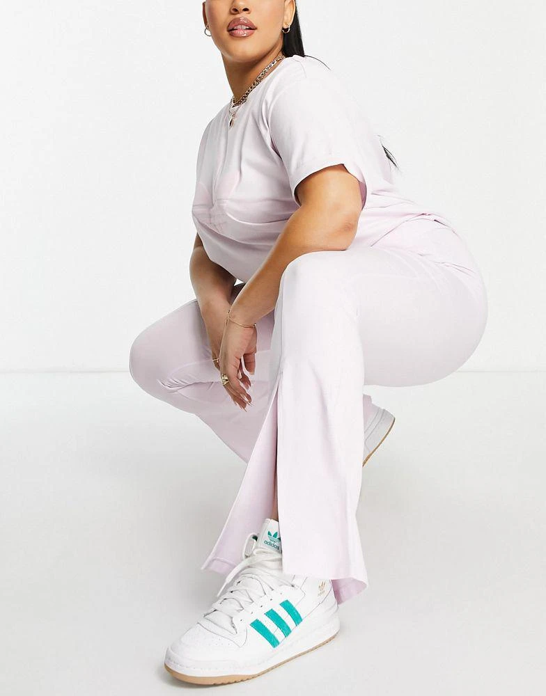 商品Adidas|adidas Originals '80's Aerobic' Plus split front flared trousers in pink,价格¥105,第3张图片详细描述