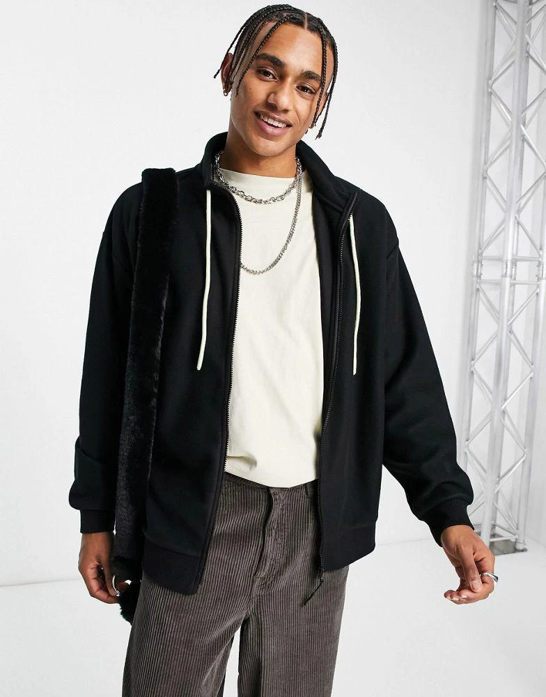 商品ASOS|ASOS Unrvlld Spply oversized zip through fleece jacket with large logo back print in black,价格¥195,第4张图片详细描述