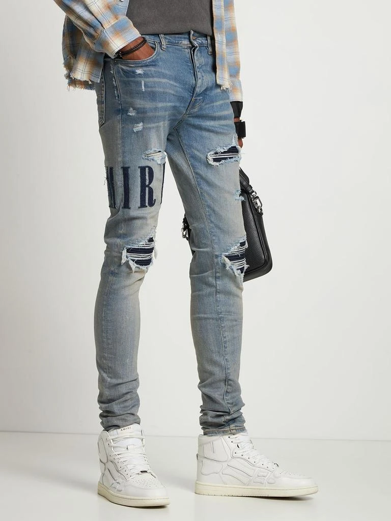 商品AMIRI|Logo Appliqué Stretch Denim Jeans,价格¥9111,第2张图片详细描述