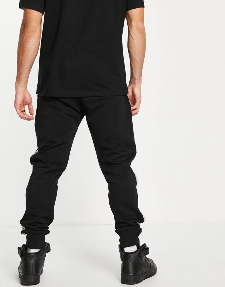 商品CHAMPION|Champion taping joggers in black,价格¥210,第2张图片详细描述