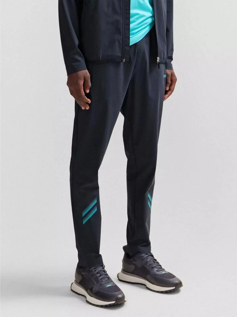 商品Hugo Boss|Regular-Fit Tracksuit Bottoms with Decorative Reflective Artwork,价格¥795,第2张图片详细描述