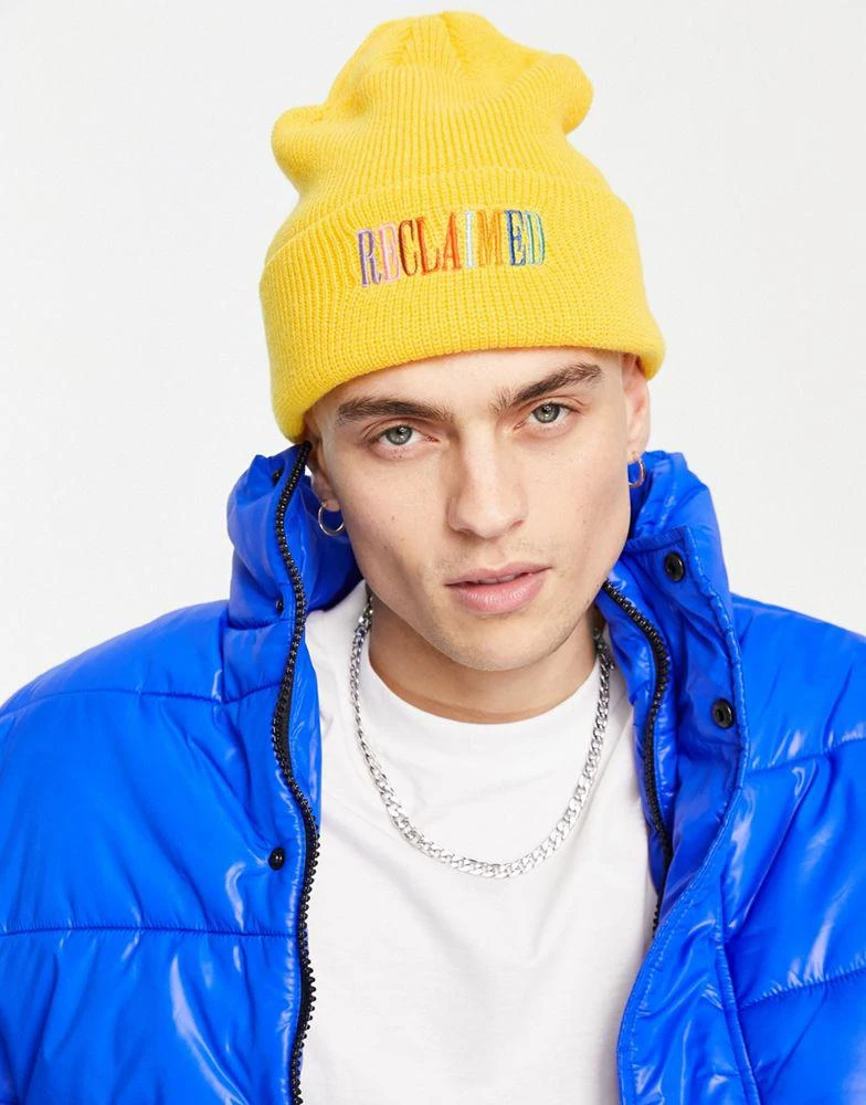 商品Reclaimed Vintage|Reclaimed Vintage inspired unisex  rainbow logo beanie in mustard,价格¥38,第3张图片详细描述