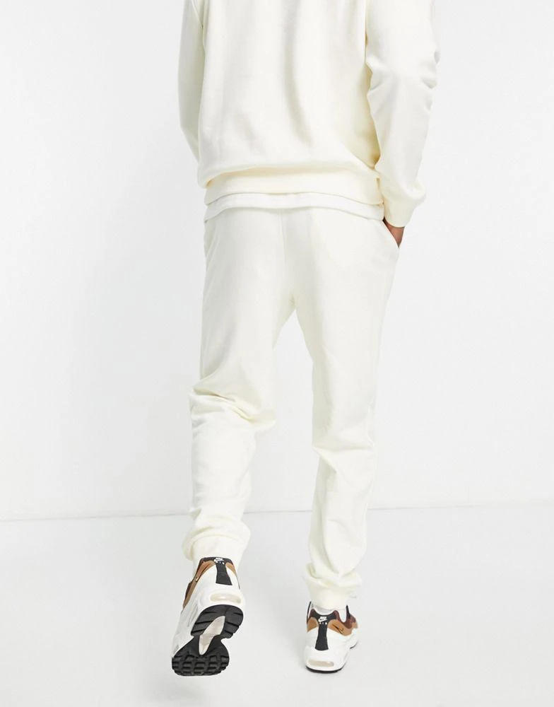 商品Fila|Fila joggers with logo in off white,价格¥171,第2张图片详细描述