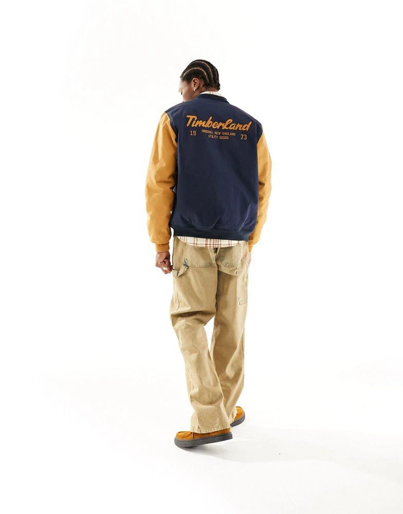 商品Timberland|Timberland utility varsity bomber jacket with back print in navy with contrast sleeves,价格¥1090,第4张图片详细描述