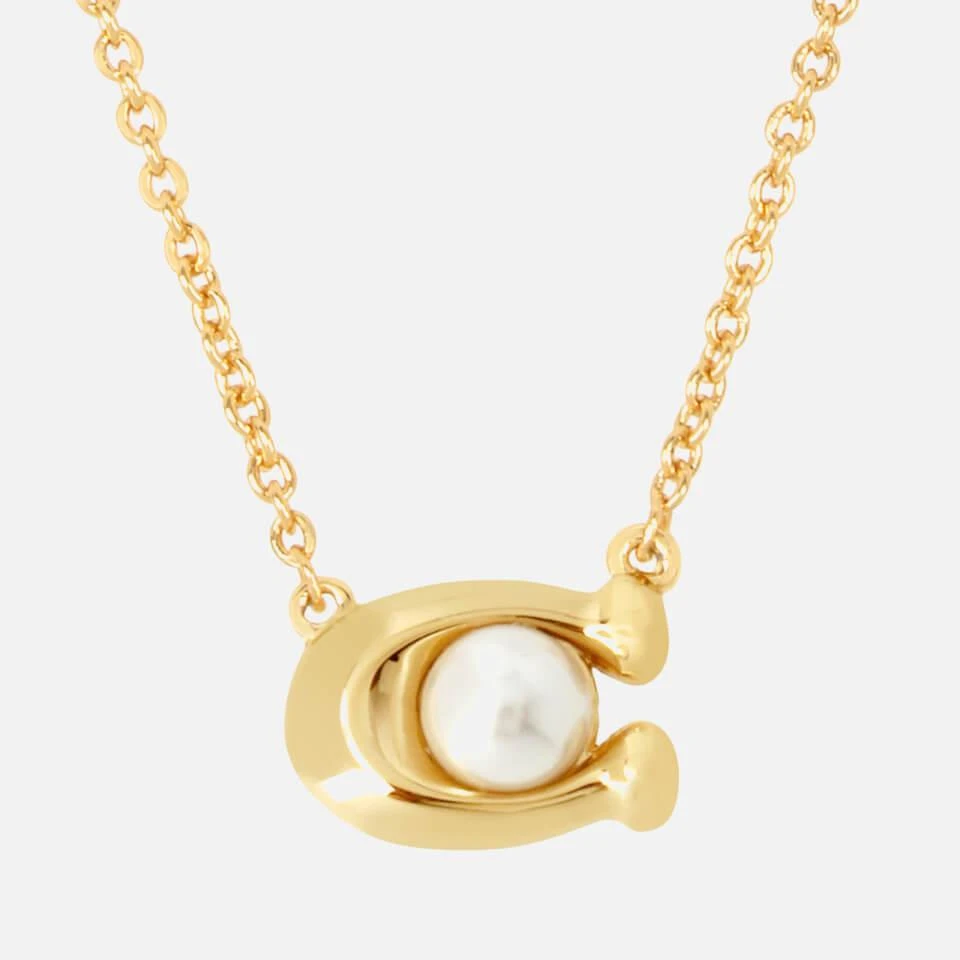 商品Coach|Coach Women's Pearl Signature Gold Tone Pendant Necklace - Gold/White,价格¥686,第2张图片详细描述
