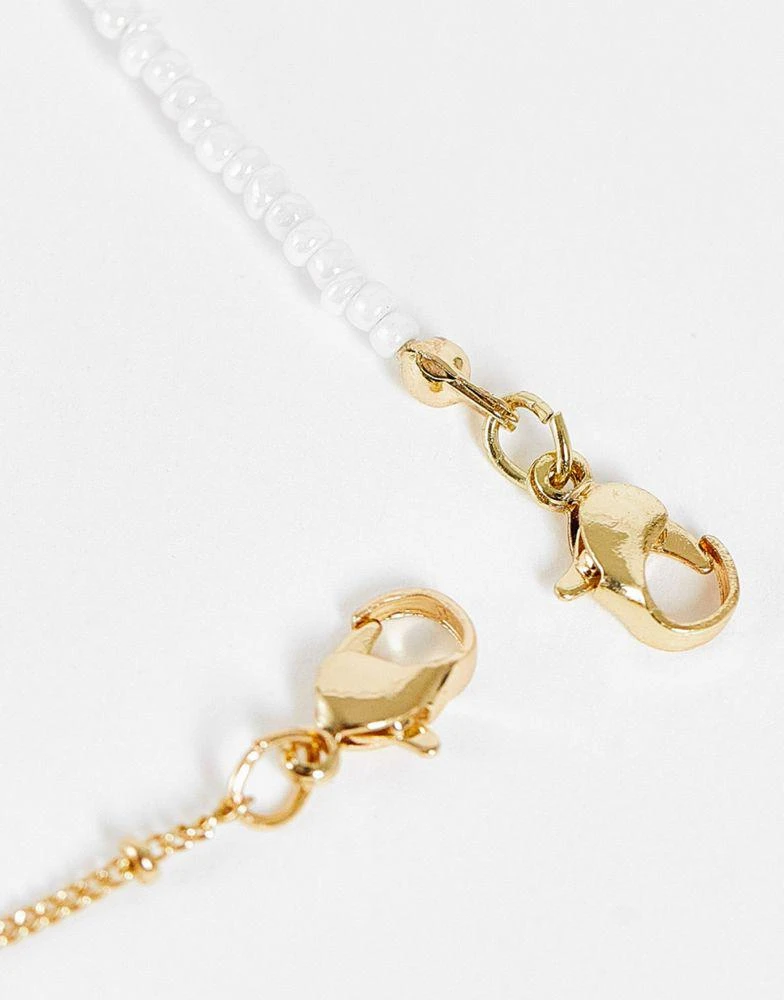 商品ASOS|ASOS DESIGN Curve pack of 2 bracelet with micro faux pearl and dot dash chain in gold tone,价格¥57,第2张图片详细描述