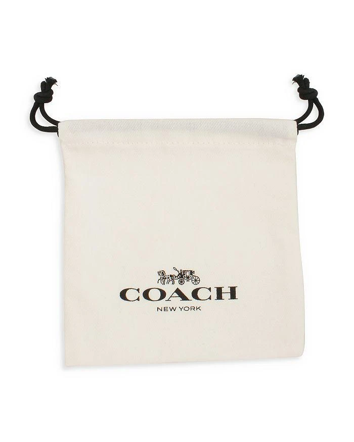 商品Coach|Crystal Tennis Huggie Hoop Earrings in Silver Tone,价格¥636,第2张图片详细描述