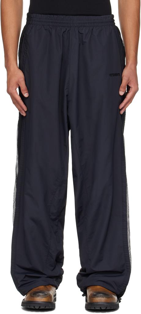 Pantalones deportivos negros con paneles de malla image 2
