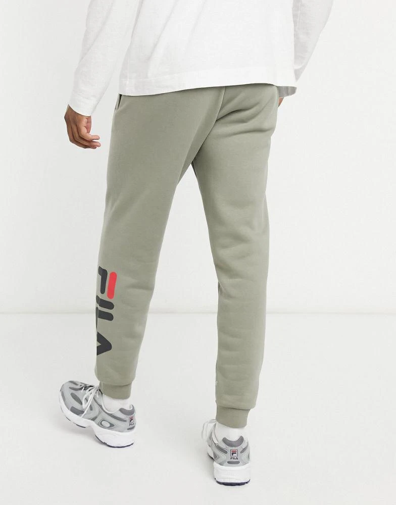 商品Fila|Fila todd logo tapered joggers in beige,价格¥273,第2张图片详细描述