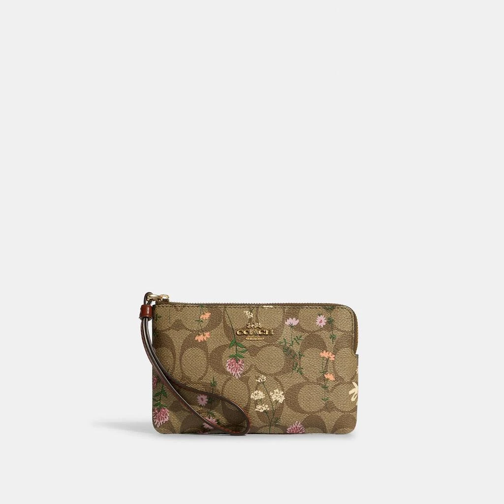 Coach Outlet Coach Outlet Corner Zip Wristlet In Signature Canvas With Wildflower Print 1