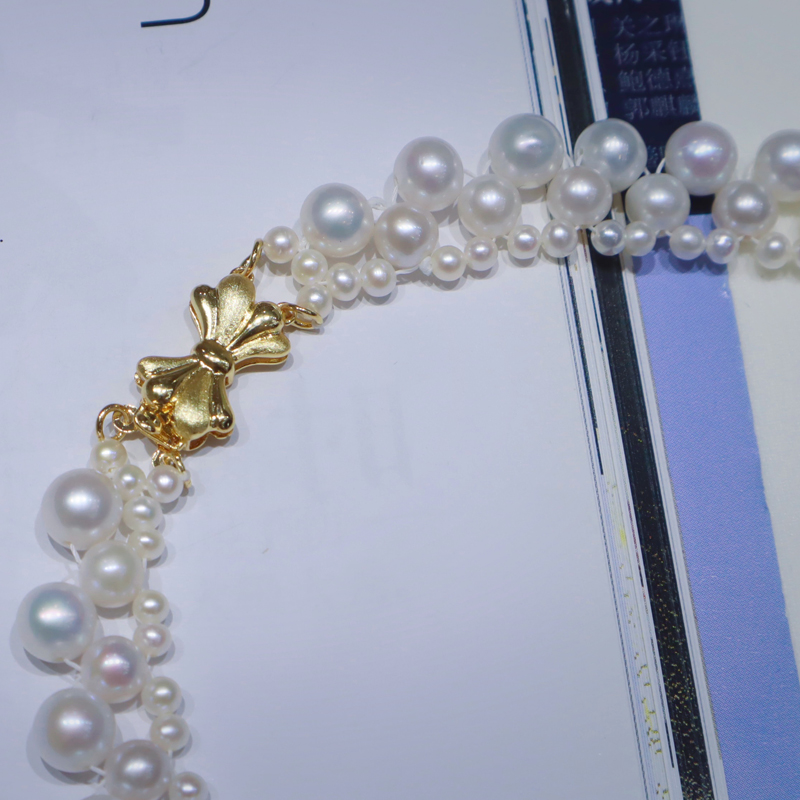 925银镀18K金淡水珍珠蝴蝶结项链商品第3张图片规格展示