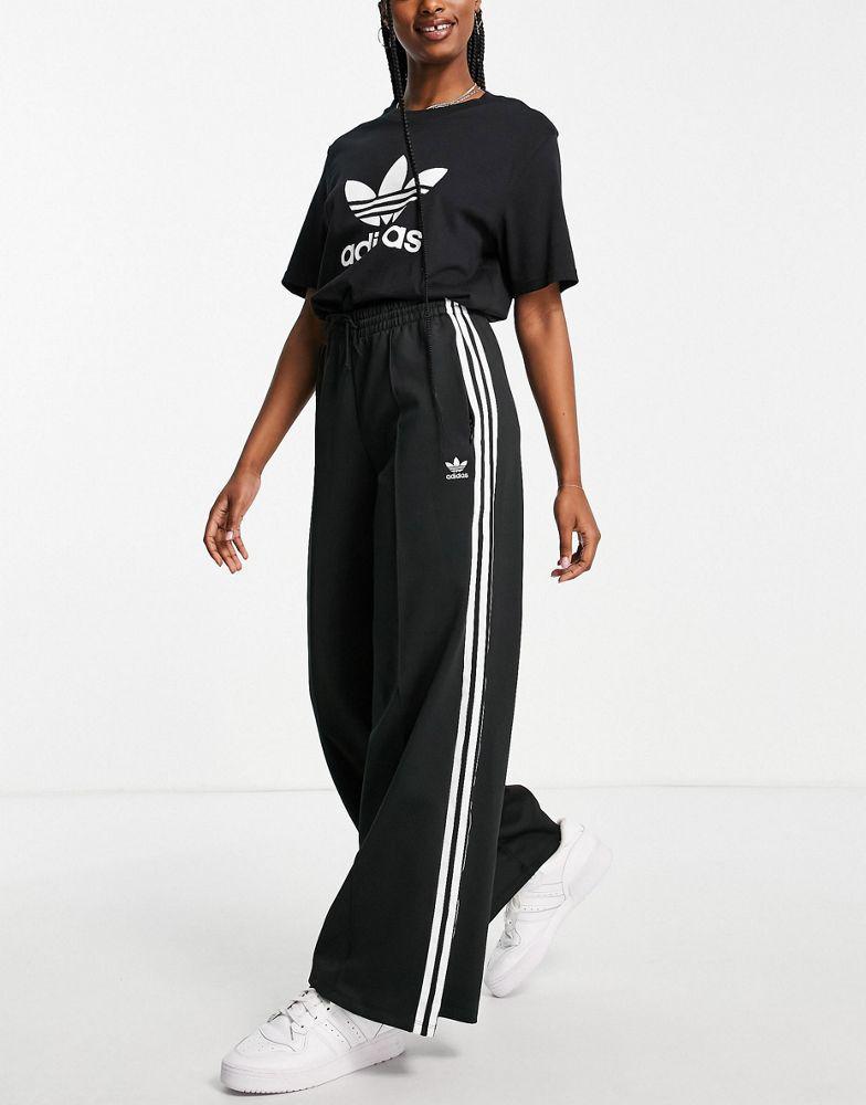 商品Adidas|adidas Originals adicolour three stripe logo relaxed fit track pants in black,价格¥419,第1张图片