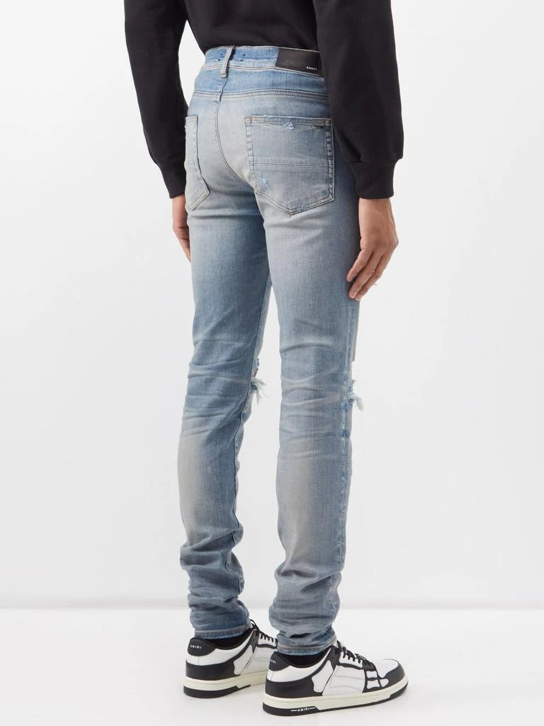 商品AMIRI|Distressed skinny-leg jeans,价格¥5014,第5张图片详细描述