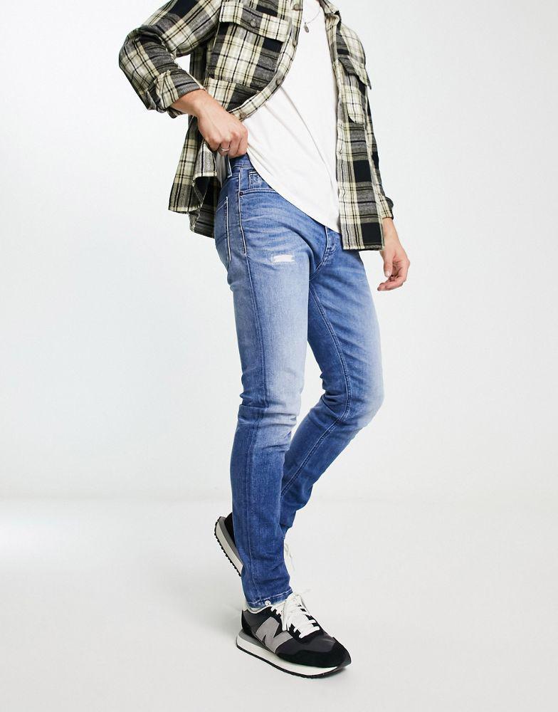 商品Tommy Jeans|Tommy Jeans simon skinny jean in mid wash,价格¥667,第1张图片