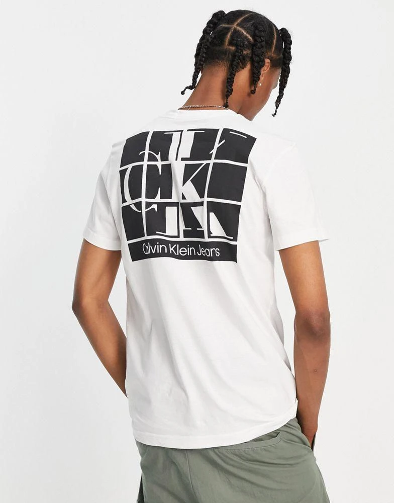 商品Calvin Klein|Calvin Klein Jeans cotton blend scattered urban back graphic t-shirt in white - WHITE,价格¥229,第1张图片