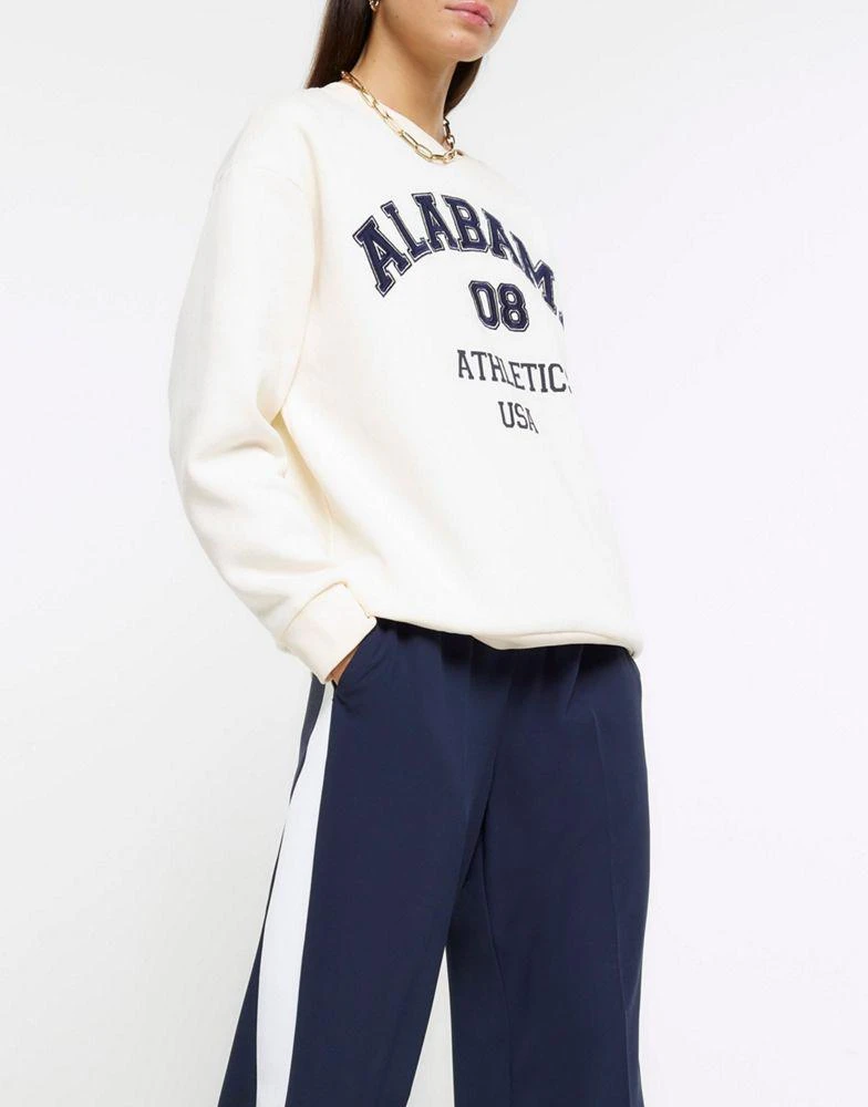 商品River Island|River Island Side stripe wide leg joggers in navy,价格¥438,第2张图片详细描述