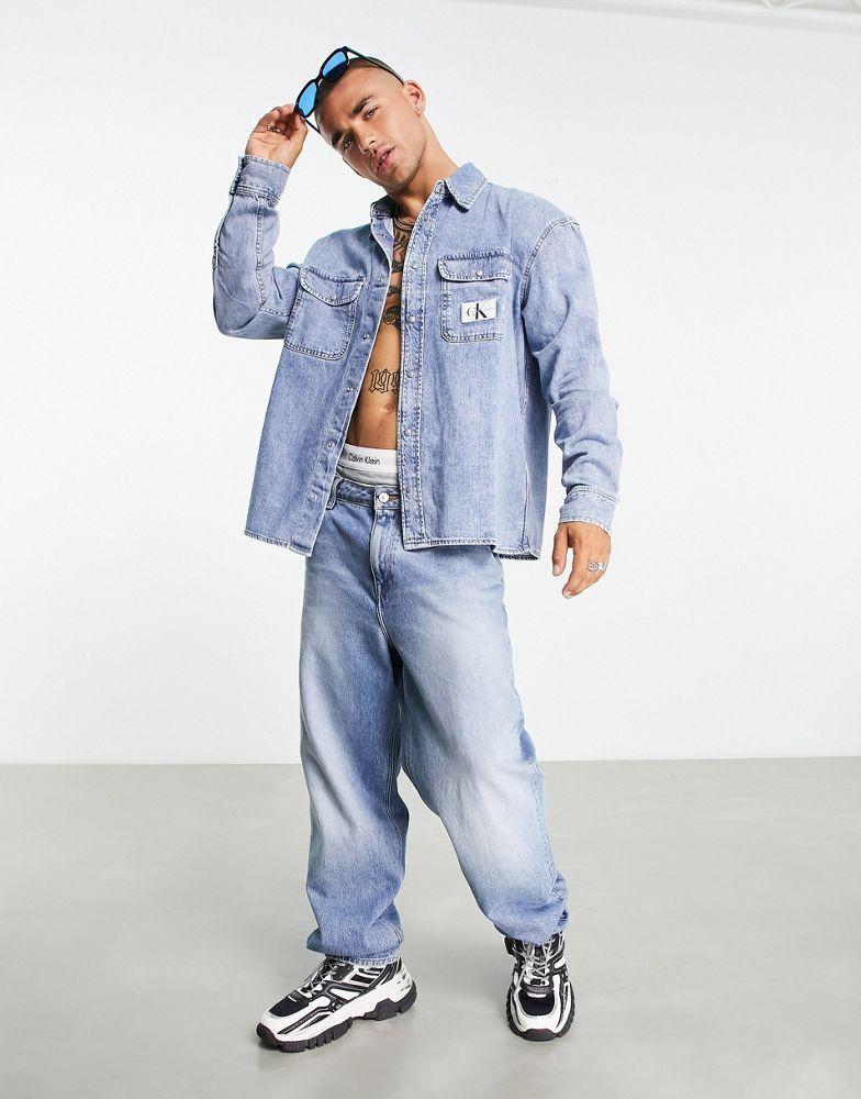 商品Calvin Klein|Calvin Klein Jeans oversized denim shirt in light wash,价格¥758,第6张图片详细描述