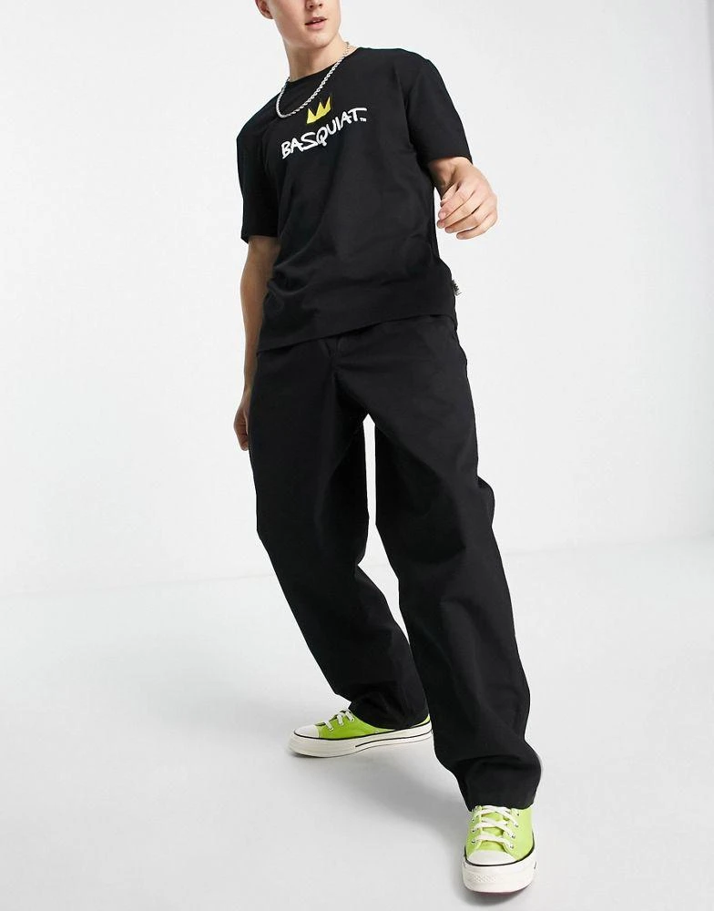 商品Vans|Vans range baggy chino trousers in black with elasticated waist,价格¥528,第1张图片