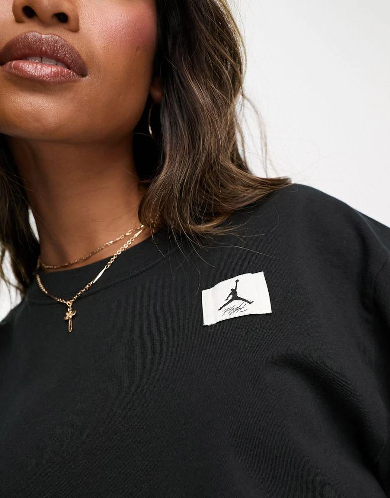 商品Jordan|Jordan Flight cropped long sleeve t-shirt in black,价格¥220,第3张图片详细描述