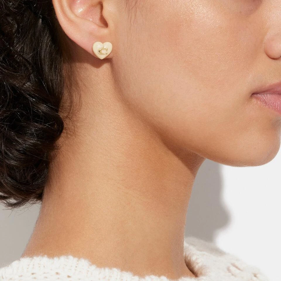 商品Coach|Coach Heart Resin Gold-Tone Stud Earrings,价格¥289,第2张图片详细描述