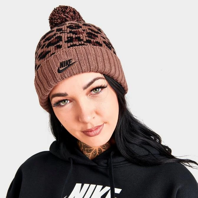 商品NIKE|Women's Nike Sportswear Leopard Print Pom Beanie Hat,价格¥75,第1张图片