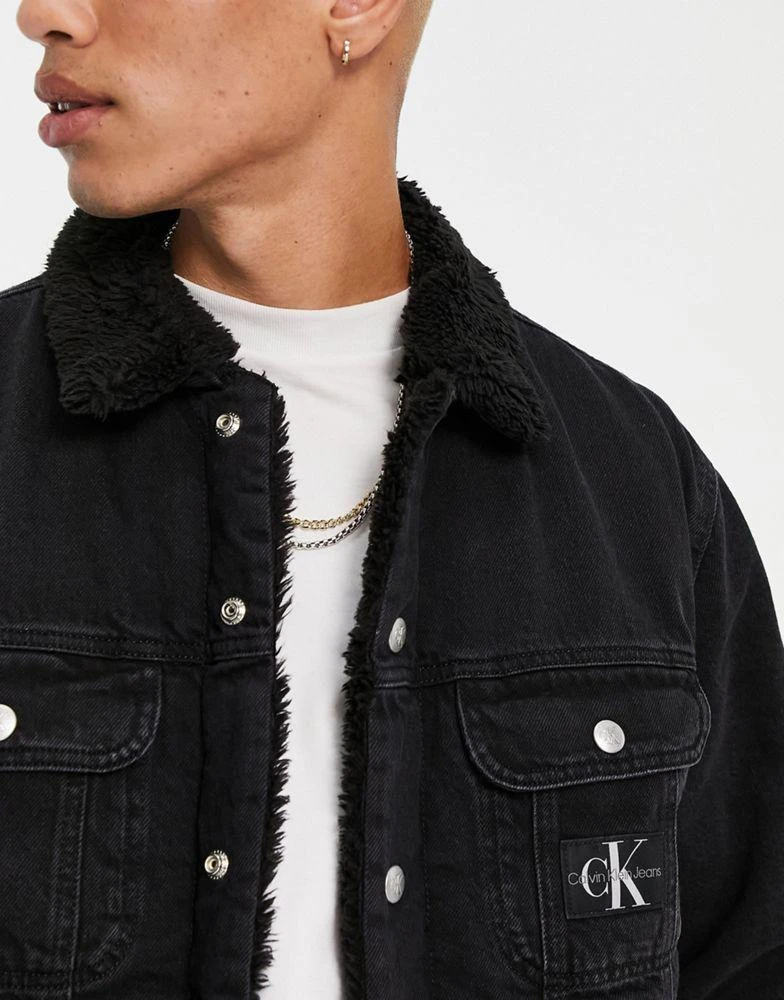 商品Calvin Klein|Calvin Klein Jeans sherpa lined denim jacket in black,价格¥856,第2张图片详细描述