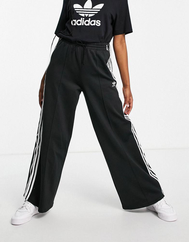 adidas Originals adicolour three stripe logo relaxed fit track pants in black商品第4张图片规格展示
