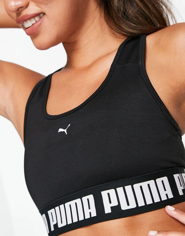 商品Puma|Puma mid impact sports bra in black,价格¥137,第2张图片详细描述