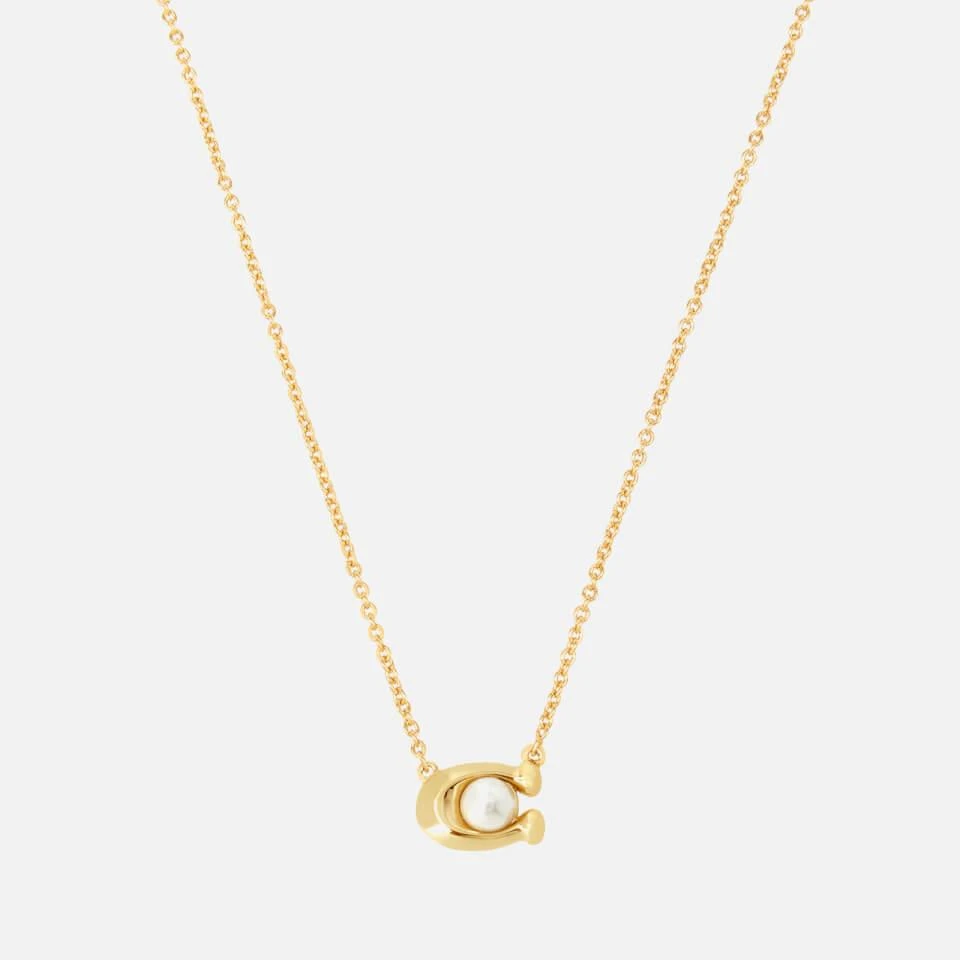 商品Coach|Coach Pearl Signature Gold-Tone Pendant Necklace,价格¥684,第1张图片