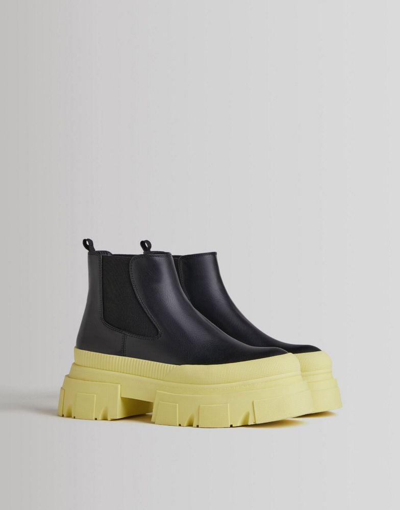 商品Bershka|Bershka chunky flat chelsea boot with contrast yellow sole in black,价格¥214,第1张图片
