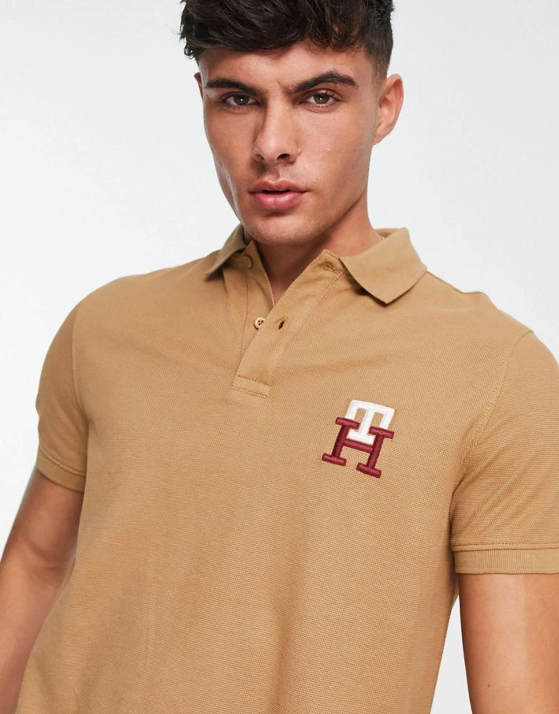 商品Tommy Hilfiger|Tommy Hilfiger monogram logo cotton blend pique polo in tan ,价格¥872,第3张图片详细描述