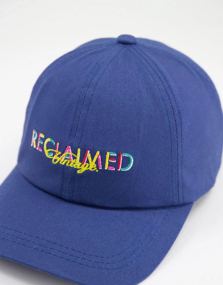 商品Reclaimed Vintage|Reclaimed Vintage inspired unisex cap with rainbow logo in navy,价格¥102,第3张图片详细描述