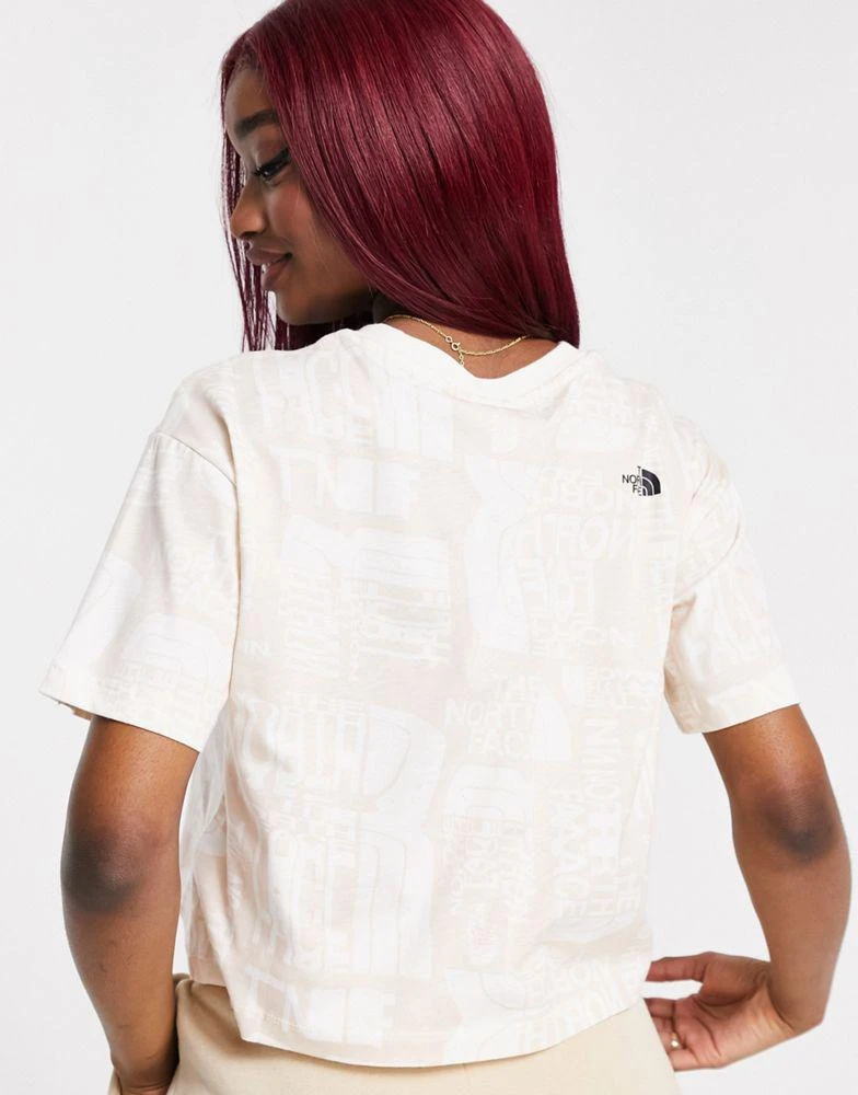 商品The North Face|The North Face Distorted cropped t-shirt in off-white Exclusive at ASOS,价格¥132,第2张图片详细描述