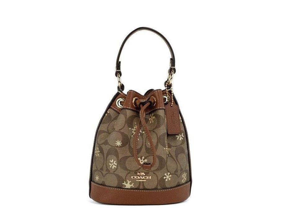 商品Coach|COACH Dempsey 15 Small Snowflake Print Khaki Coated Canvas Bucket Bag,价格¥2157,第1张图片