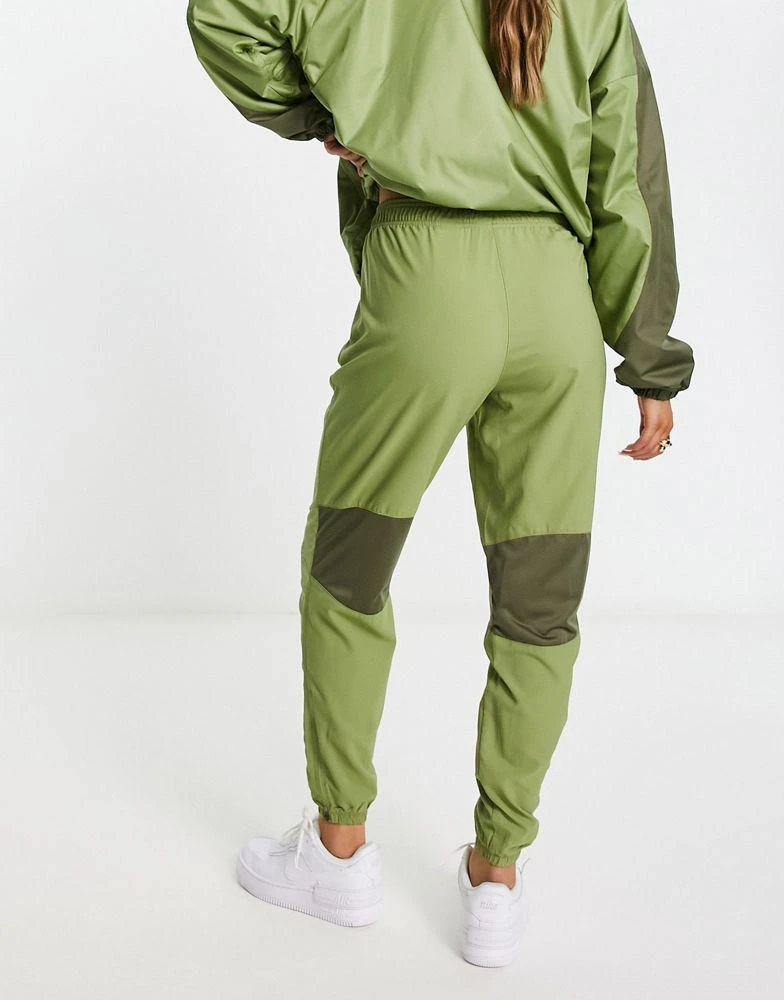 商品NIKE|Nike Running Air Dri-FIT woven joggers in khaki,价格¥399,第3张图片详细描述