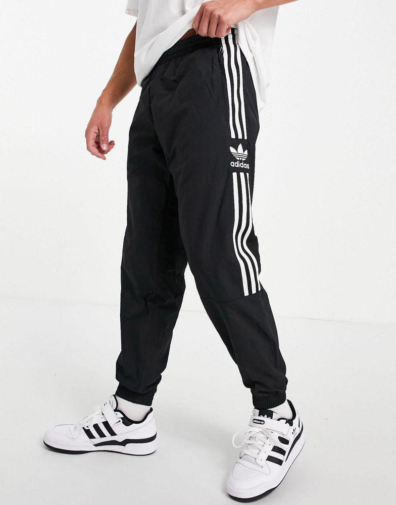 商品Adidas|adidas Originals adicolor lock up joggers in black,价格¥294-¥452,第1张图片