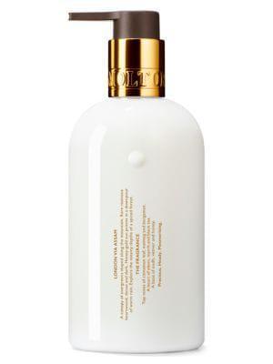 商品Molton Brown|Mesmerising Oudh Accord & Gold Hand Lotion,价格¥181,第4张图片详细描述