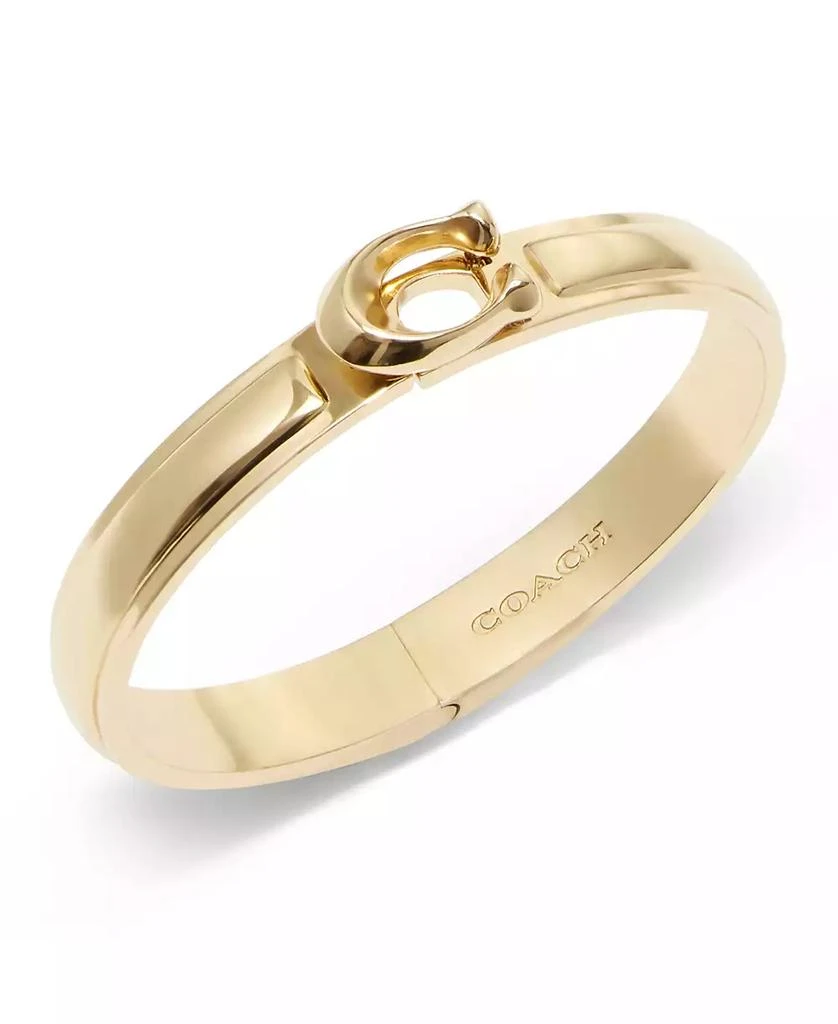 商品Coach|Gold-Tone Signature Tabby Sculpted C Bangle Bracelet,价格¥655,第1张图片