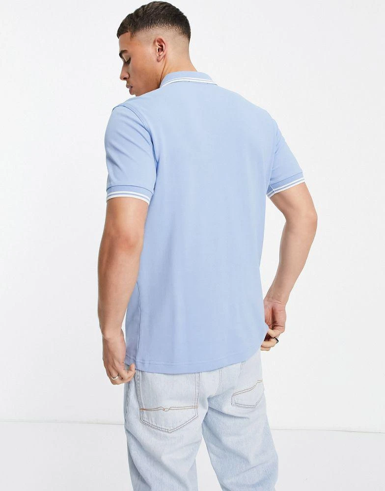 商品Fred Perry|Fred Perry twin tipped logo polo in light blue,价格¥707,第2张图片详细描述