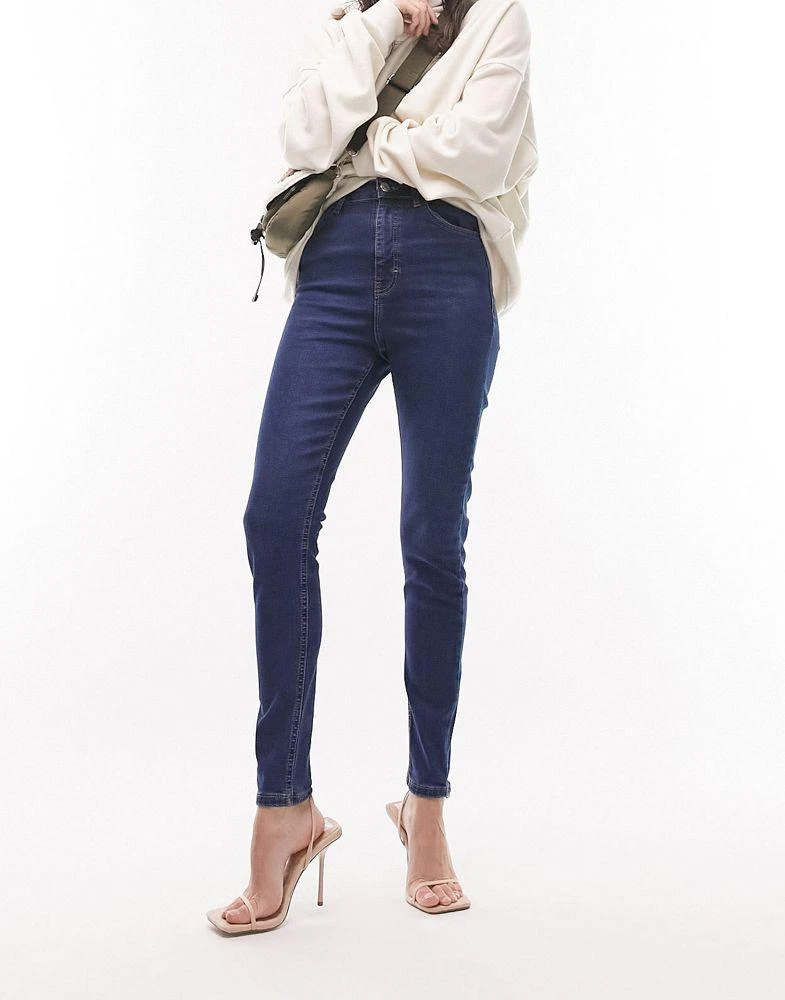 商品Topshop|Topshop high rise enhancing Jamie jeans in mid blue,价格¥172,第1张图片