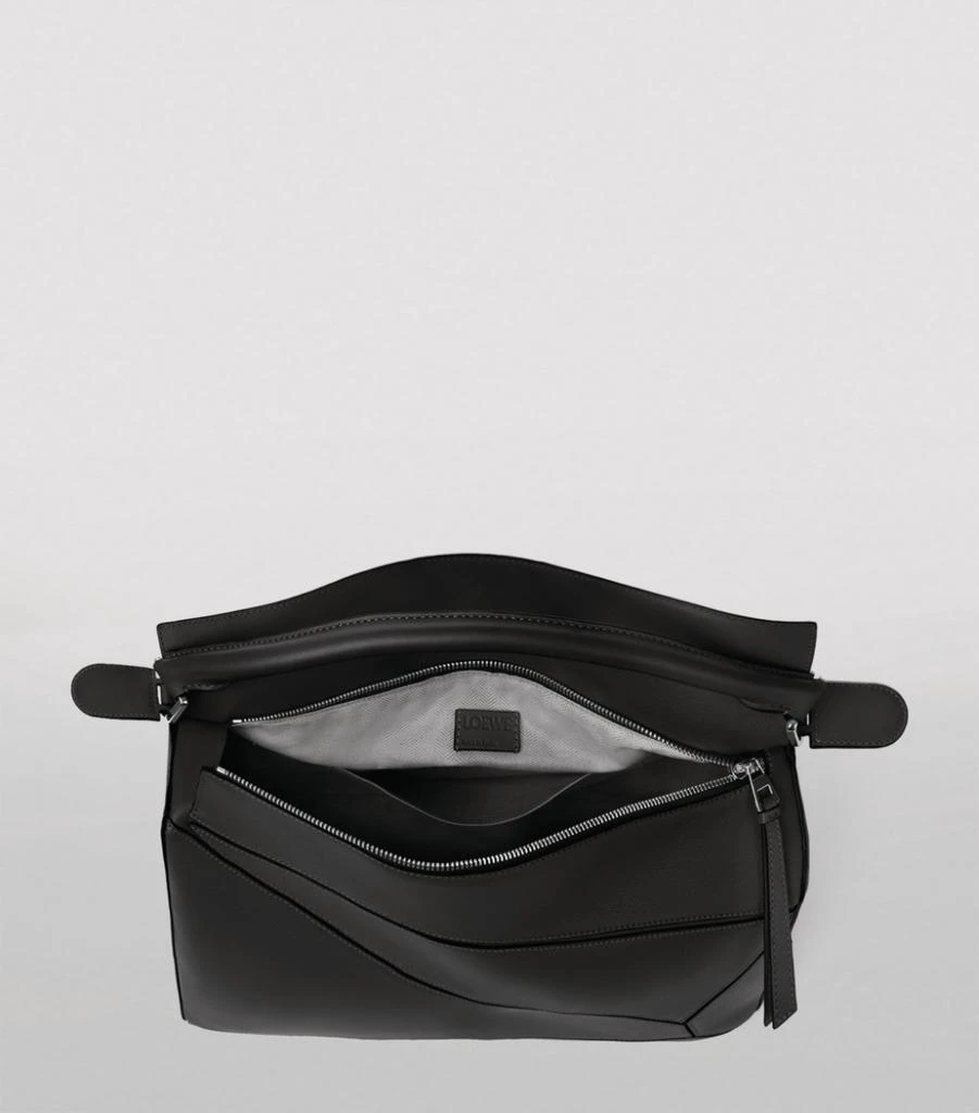 Leather Puzzle Top-Handle Bag 商品